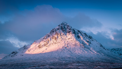 Fototapeta na wymiar Mountain nature landscape winter snow ice in Glencoe Scotland