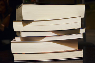A pile of six books