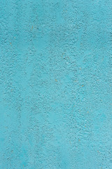 Old wall covered with cracked blue paint. For design, banner and layout