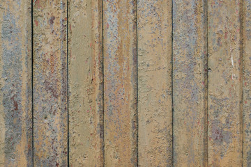 Old metal fence with brown peeling paint. For design, banner and layout