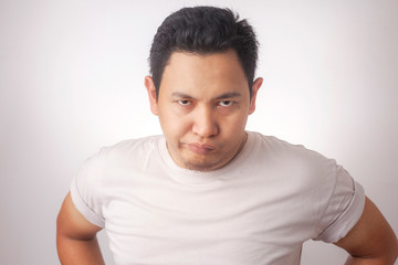 Obraz premium Cynical Asian Man Expression