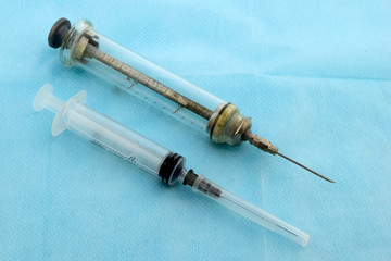 old glass and plastic disposable syringes