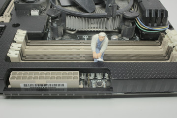 a Worker team of engineers repairing compute