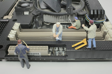 a Worker team of engineers repairing compute