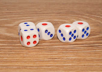 dice on wooden background
