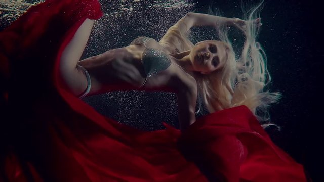 Charming mermaid shoot underwater.
