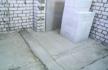 concrete basement prepared for further brick laying