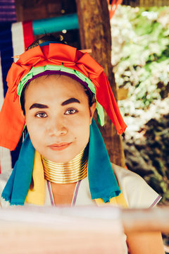 Portrait of long neck woman in traditional costume. Karen long neck tribe northern Thailand.