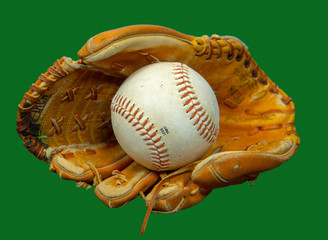 Baseball mitt and baseball against green background. 