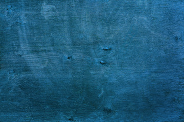 The texture of the plywood is blue. Rough plywood sheet texture