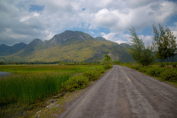 landscape of mountains and big green lake, Sam Roi Yot, Thailand.