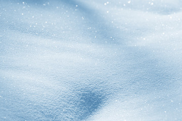Obraz premium Fresh snow background texture. Winter background with snowflakes and snow mounds. Snow lumps.