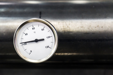 pressure gauge for measuring installed in water or gas systems. Plumbing, fixing pipes and fittings...