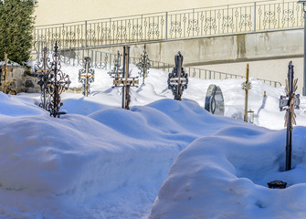 graveyard in winter in the alps