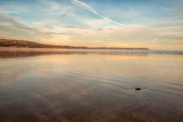 Fototapeta na wymiar Landscape image of Oxwich Bay, Swansea, South Wales at sunset