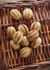 Traditional russian festive cookies in nut shape with caramelized milk inside