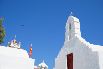Bell towers with bells and blue sky at Chora, Mykonos