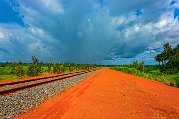 Fototapeta premium A newly laid section of rail track between Kamsar and Sangaredi in the west of the Guinea for the delivery of bauxite by train shuttle.