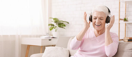 Senior woman listening to her favourite music