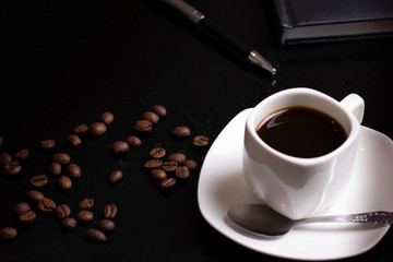 cup of coffee with beans