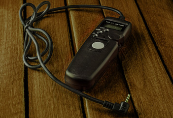 remote camera shutter release on wooden table