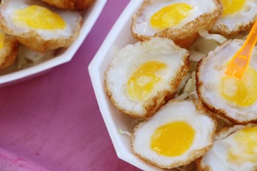 Quail eggs with sauce in street food