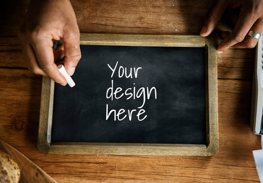 Small Blackboard on Wooden Table Mockup