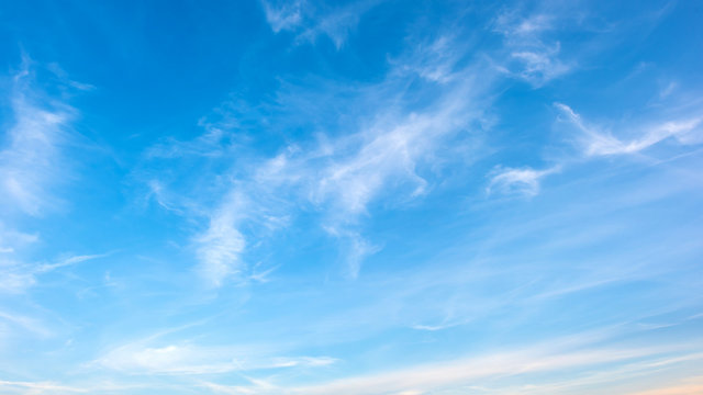 Clouds on a blue sky as background