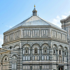 Fototapeta na wymiar The Baptistery is one of the oldest buildings in Florence Italy. 4th century. Iconic octagonal basilica with striking marble facade, known for its bronze doors and mosaic ceiling. Italy, Florence