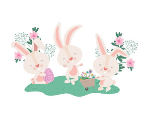 Obraz na płótnie Canvas rabbits with wheelbarrow and easter egg icon