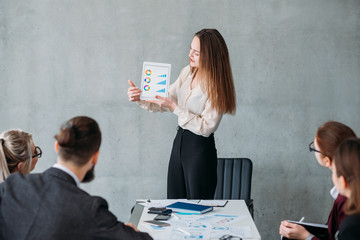 Marketing strategy. Business revenue growth. Company analyst pointing at financial statistics.