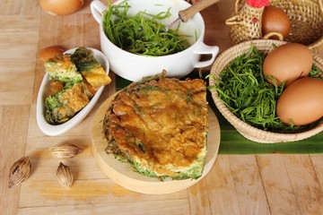 Fried acacia pennata omelette at street food