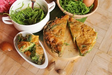 Fried acacia pennata omelette at street food