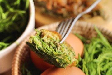 Fried acacia pennata omelette at street food