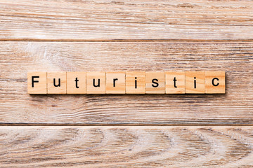 Futuristic word written on wood block. Futuristic rors text on wooden table for your desing, concept