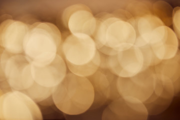 blurred golden sparkles on dark background