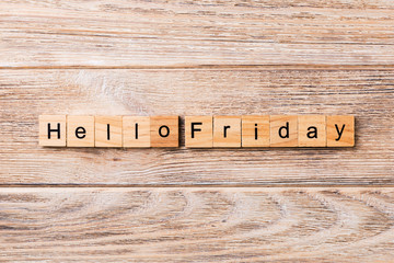 hello friday word written on wood block. hello friday text on wooden table for your desing, concept