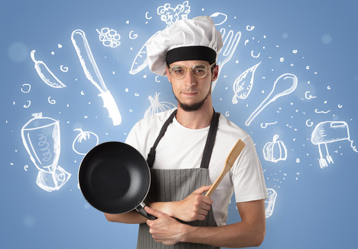 Young Cook With Kitchen Instruments And Drawn Recipe Concept On Wallpaper