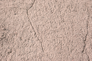 Textured concrete wall as abstract light pink background for poster, calendar, post, screensaver, wallpaper, postcard, banner, cover, card, website, copy space for your design or text