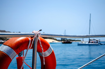 Lifebelt hanging on boat