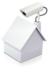Maison et sa caméra de surveillance (reflet)