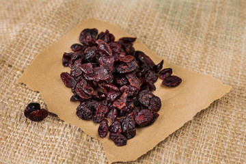 dried cranberries isolated on paper 