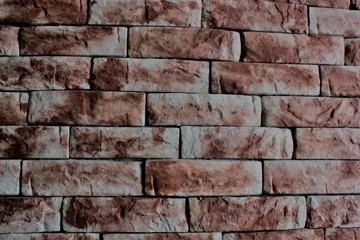 Brick decorative in finishing of the room from within. The wall is made of bricks.