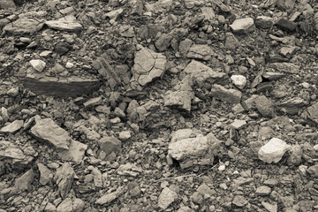 Gold abstract background of limestone stones and crumbs. Abstract texture of limestone soil. Natural golden background. High quality photo