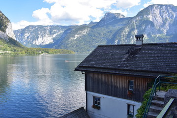 house in the mountains by a lake, Austria, Hallstatt