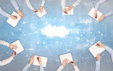 Group of people with devices in hands working on reports with online teamwork and cloud technology...