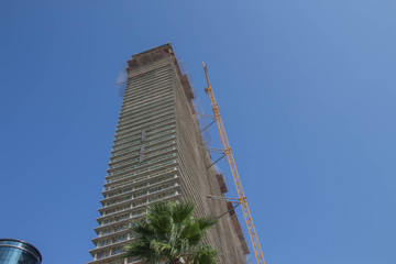 Construction of skyscrapers on a background of the dark