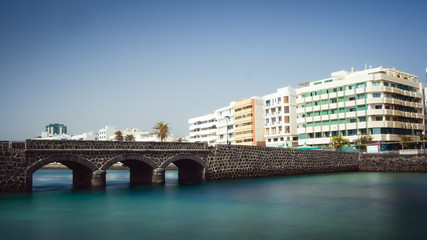 Fototapeta premium Bridge to the San Gabriel castle in Arrecife, Lanzarote. Long exposure.