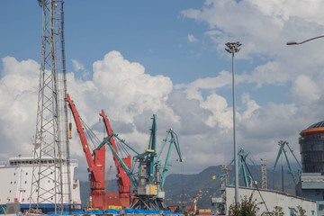 cranes at the terminal cargo port, cargo cranes without work in an empty port harbor. Defaulted paralyzed the entire economy of the state