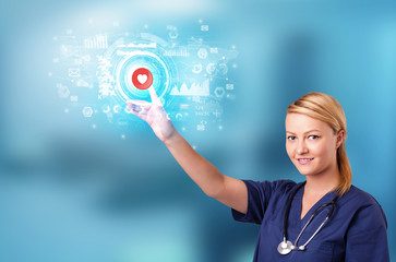 Doctor touching hologram screen displaying medical symbols and charts
